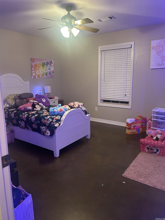 bedroom with baseboards, visible vents, concrete flooring, and a ceiling fan