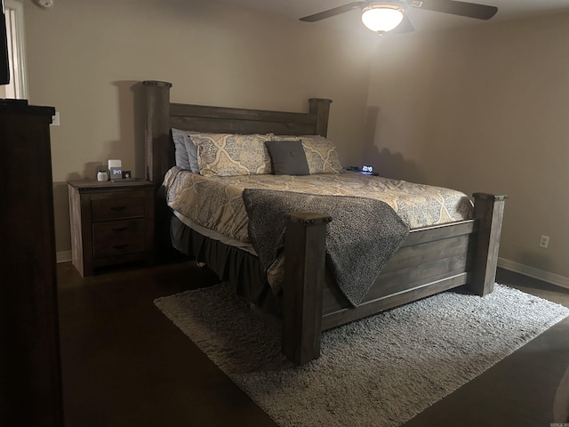 bedroom featuring a ceiling fan and baseboards