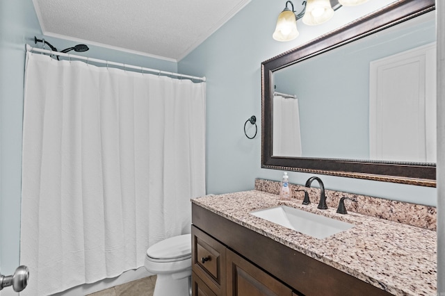 full bathroom featuring crown molding, toilet, a textured ceiling, vanity, and tile patterned floors