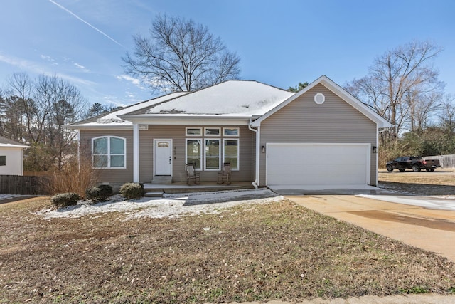 ranch-style home featuring a garage, driveway, fence, and a porch