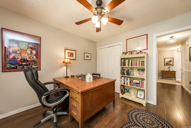 office with dark wood-style floors, ceiling fan, a textured ceiling, and baseboards