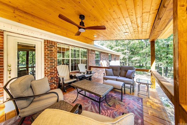 exterior space featuring a ceiling fan and outdoor lounge area