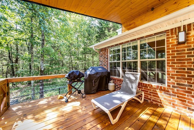 wooden deck with grilling area