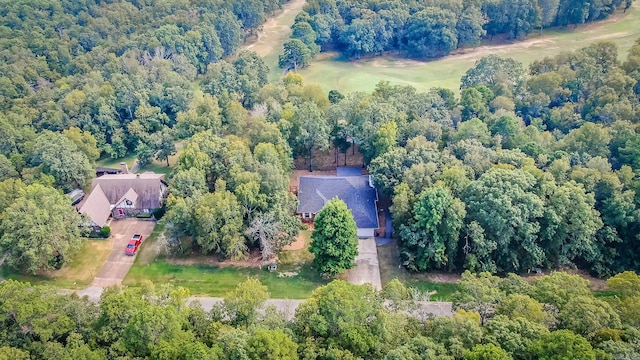 aerial view featuring a view of trees