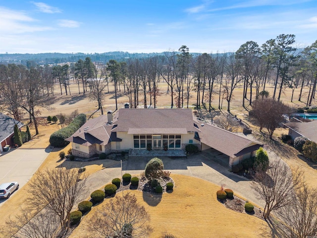 birds eye view of property with a rural view