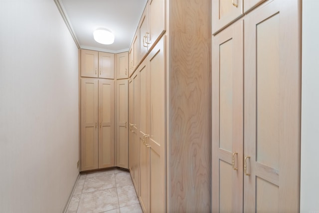 corridor with light tile patterned flooring