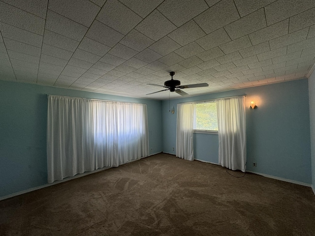 unfurnished room with carpet flooring and ceiling fan