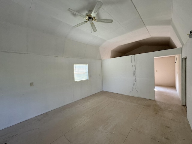 interior space featuring vaulted ceiling and a ceiling fan