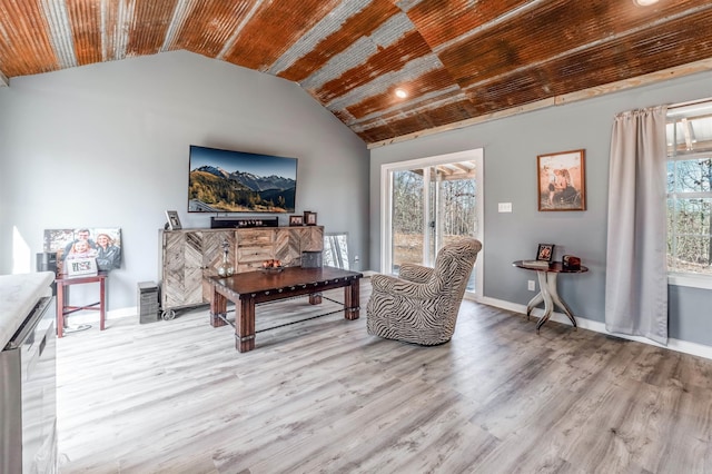 living room featuring lofted ceiling, light wood-type flooring, wooden ceiling, and baseboards