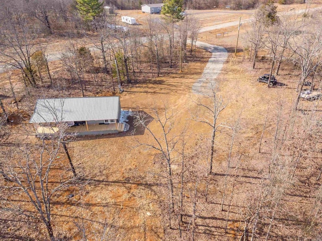 birds eye view of property featuring a rural view