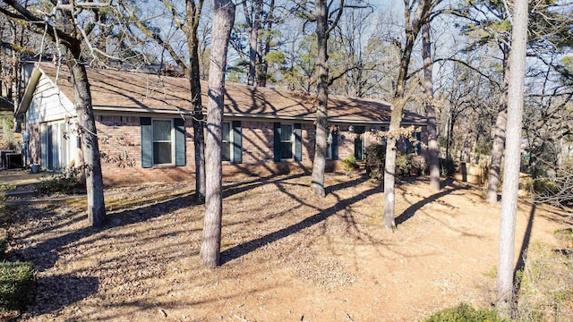 exterior space with brick siding