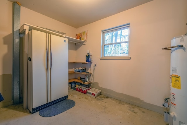 interior space with water heater and baseboards