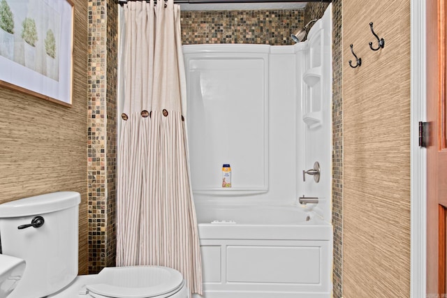 full bathroom featuring toilet, tile walls, and shower / tub combo with curtain