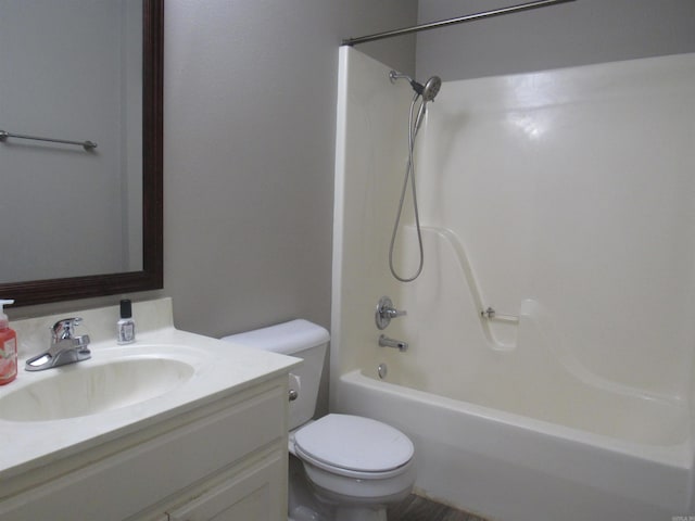 full bath featuring shower / bath combination, vanity, and toilet