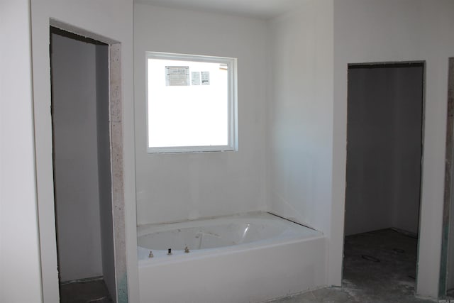 bathroom featuring a bath