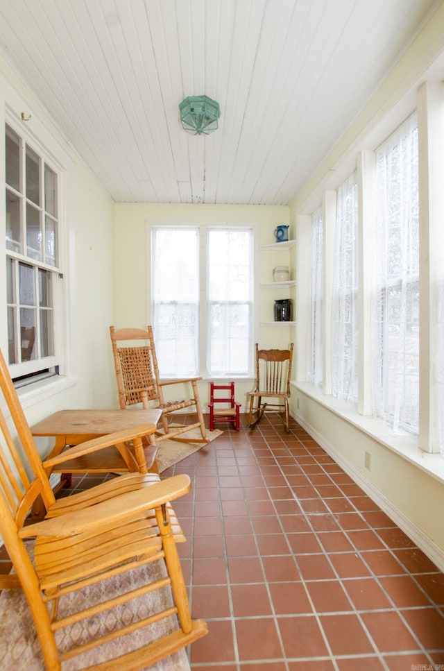 sunroom / solarium with wood ceiling