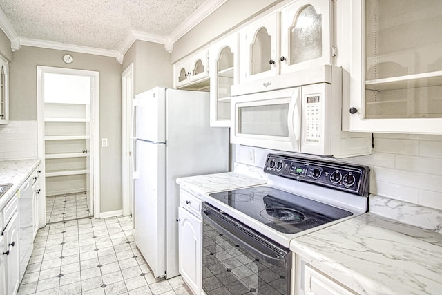 kitchen featuring crown molding, glass insert cabinets, white cabinets, a textured ceiling, and white appliances