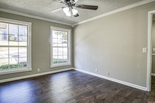 spare room with ornamental molding, dark wood-type flooring, a textured ceiling, and baseboards