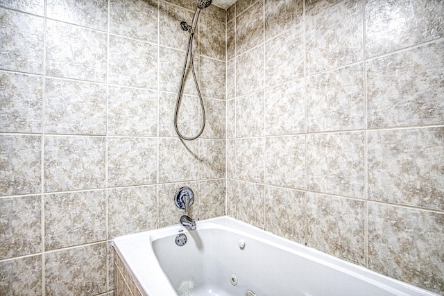 bathroom featuring a combined bath / shower with jetted tub