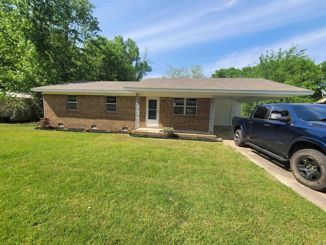 ranch-style home with an attached carport, crawl space, brick siding, and a front lawn