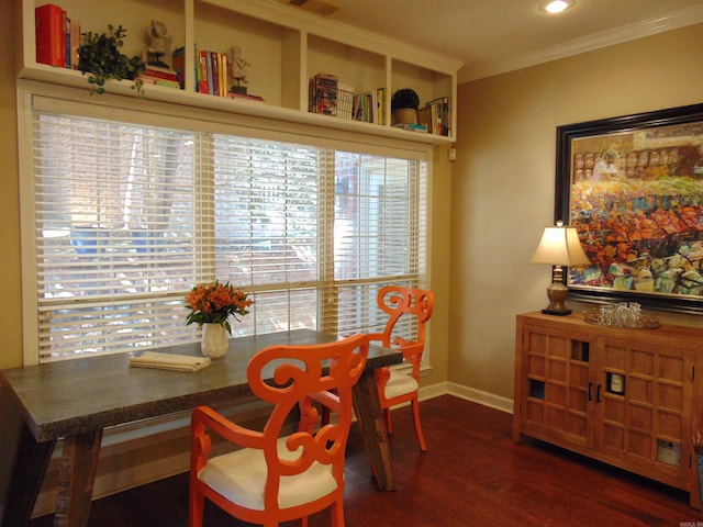 dining room featuring recessed lighting, crown molding, baseboards, and wood finished floors