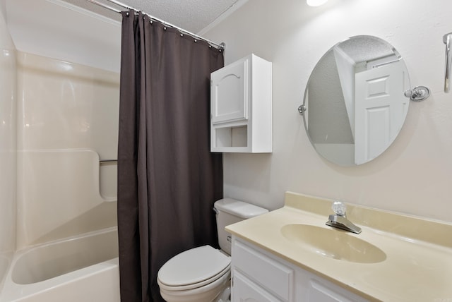 bathroom featuring toilet, shower / bath combo, a textured ceiling, and vanity