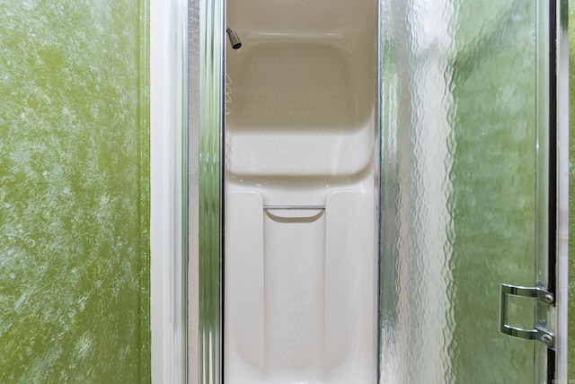 room details with an enclosed shower