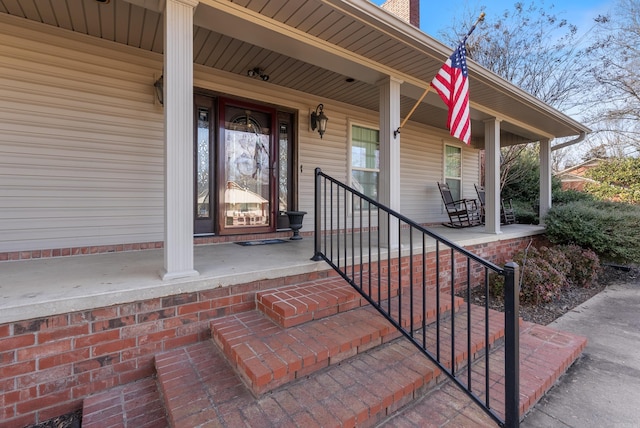 property entrance with a porch