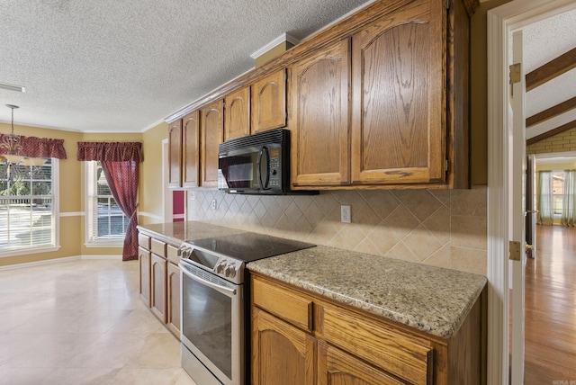 kitchen with tasteful backsplash, electric range, light stone counters, brown cabinets, and black microwave