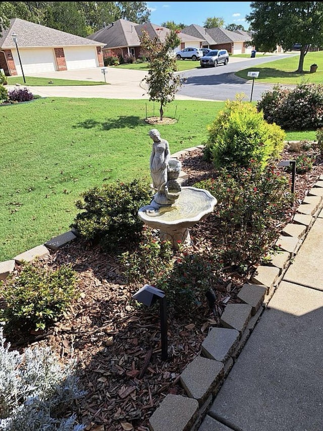 view of yard featuring a residential view