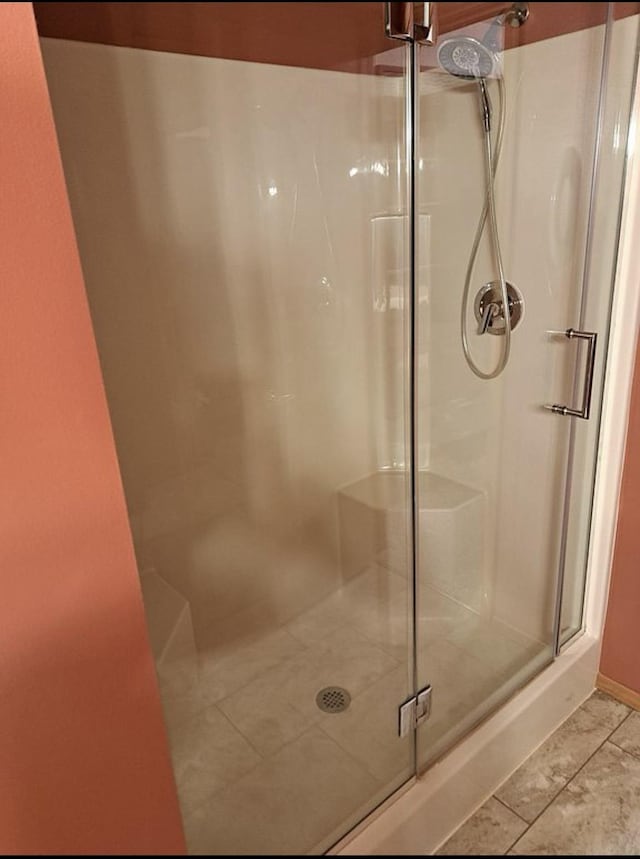 bathroom with an enclosed shower