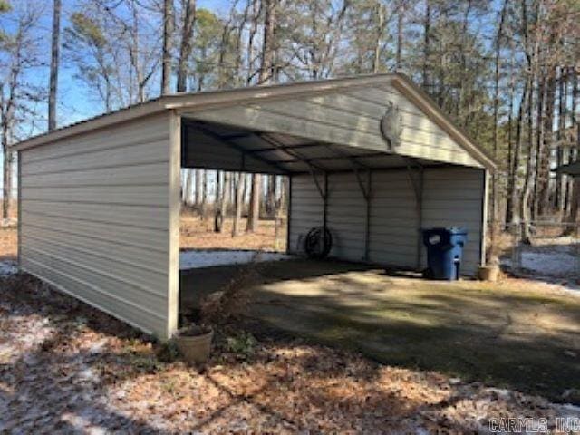 view of outdoor structure with a carport