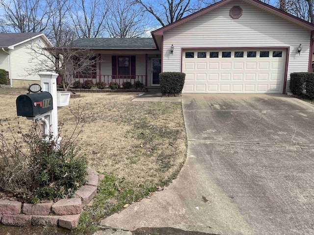 single story home featuring covered porch, an attached garage, and concrete driveway