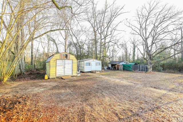 420 Sales St, Camden, AR 71701 - view of yard featuring a storage shed and an outdoor structure