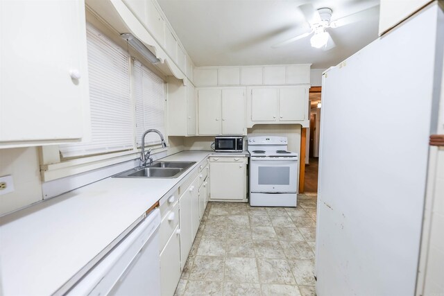 420 Sales St, Camden, AR 71701 - kitchen featuring white appliances, a sink, white cabinetry, a ceiling fan, and light countertops