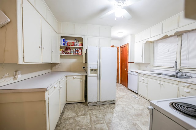 420 Sales St, Camden, AR 71701 - kitchen featuring open shelves, light countertops, white cabinets, a sink, and white appliances