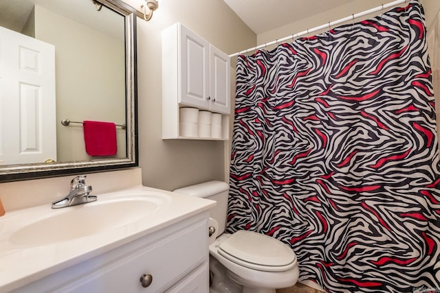 full bath featuring toilet and vanity