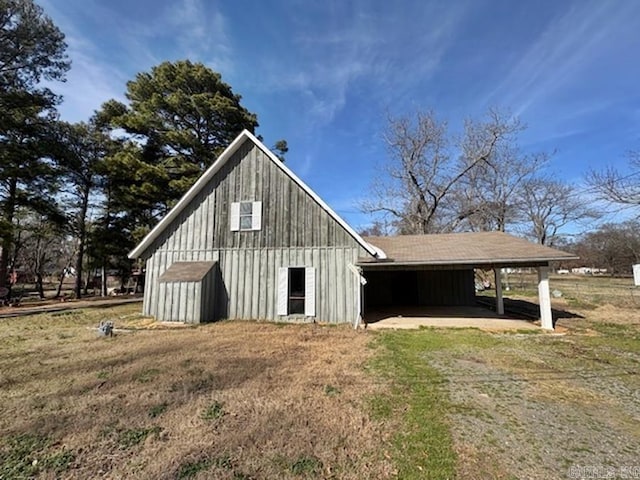 view of outdoor structure with a carport