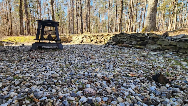 exterior space with a forest view