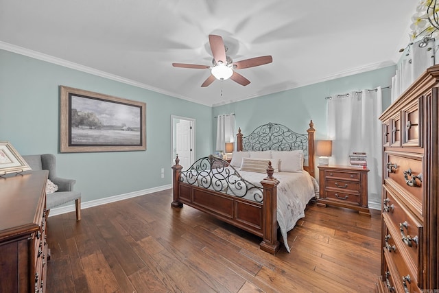 bedroom with ornamental molding, dark wood finished floors, and baseboards