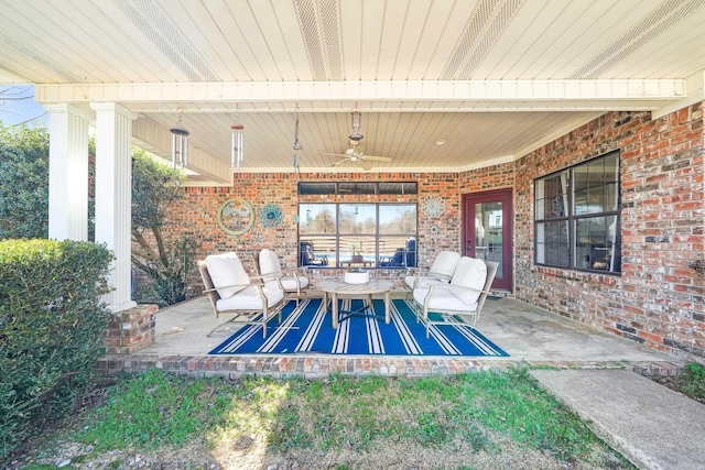 view of patio / terrace with a ceiling fan and outdoor dining space