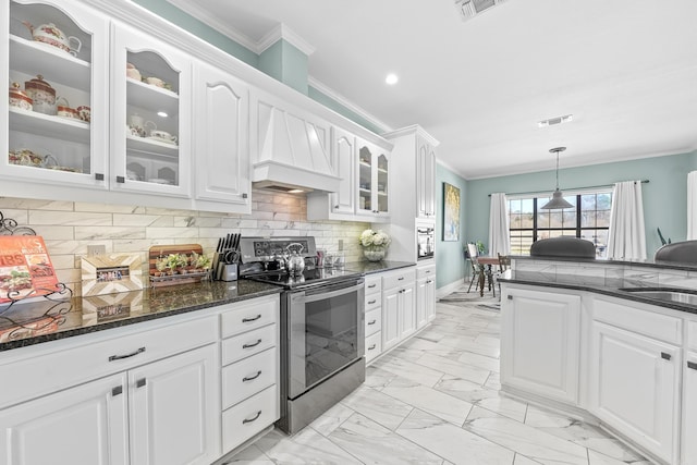 kitchen with marble finish floor, decorative light fixtures, ornamental molding, white cabinetry, and stainless steel electric range