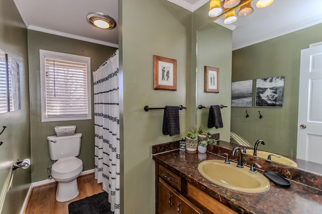 full bath with crown molding, toilet, vanity, and wood finished floors