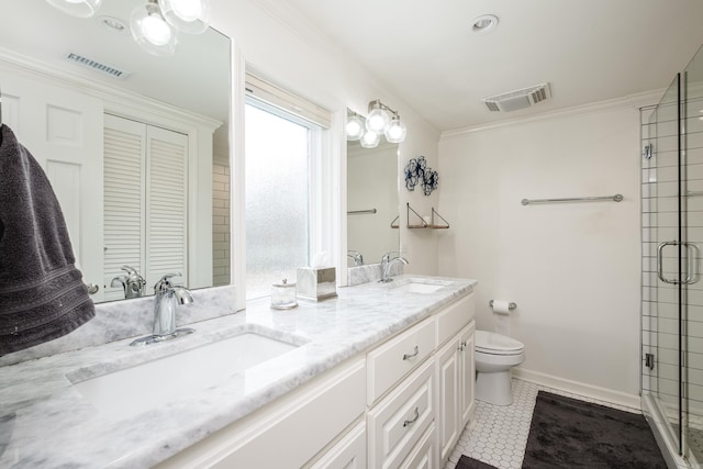 full bathroom featuring a stall shower, visible vents, toilet, ornamental molding, and a sink