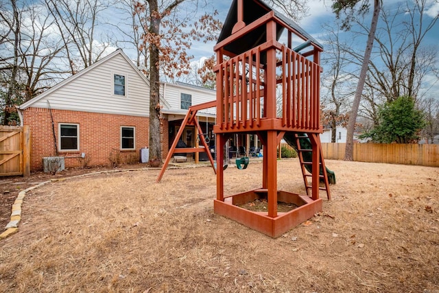 view of jungle gym with fence