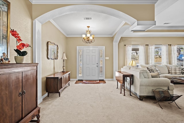 foyer featuring arched walkways, light carpet, visible vents, baseboards, and crown molding