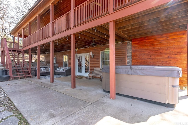 view of patio with a ceiling fan, stairs, french doors, a wooden deck, and a hot tub