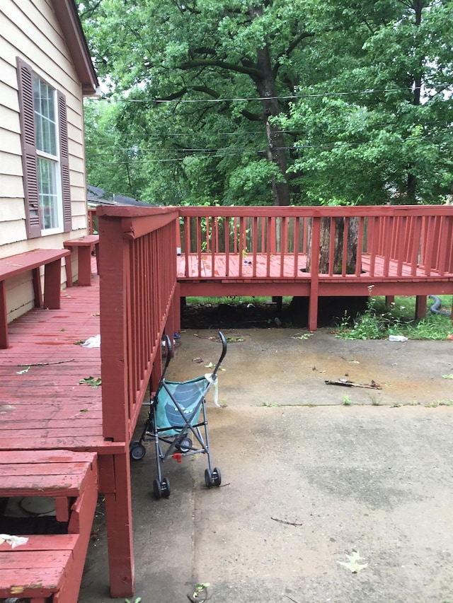 wooden deck featuring a patio area