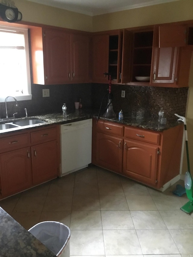 kitchen with white dishwasher, open shelves, a sink, light tile patterned floors, and tasteful backsplash