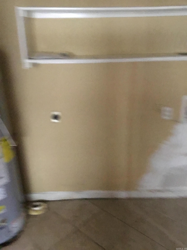 interior space featuring baseboards